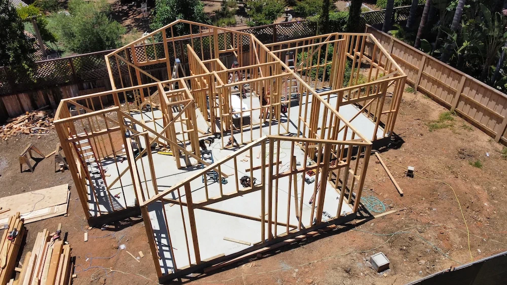 Early construction phase of a modern accessory dwelling unit in San Diego with wooden framing visible.