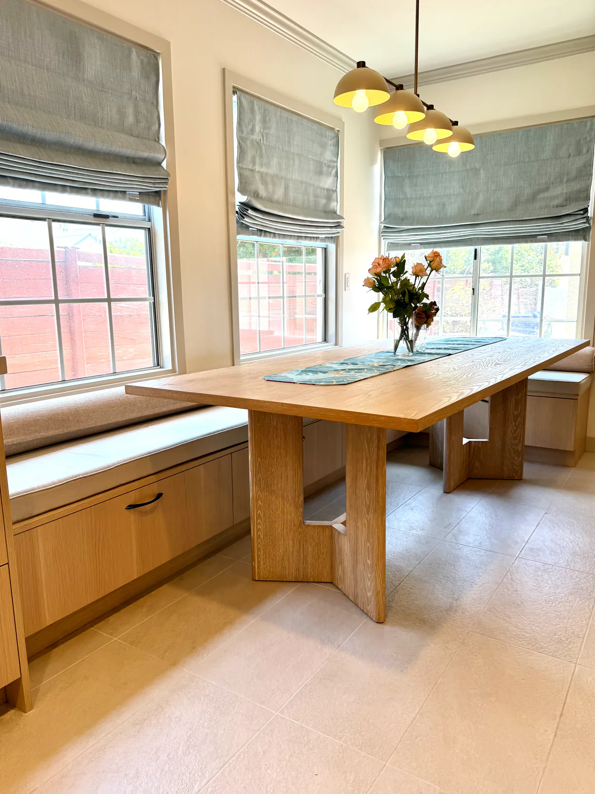 Banquette seating with storage drawers under the bench