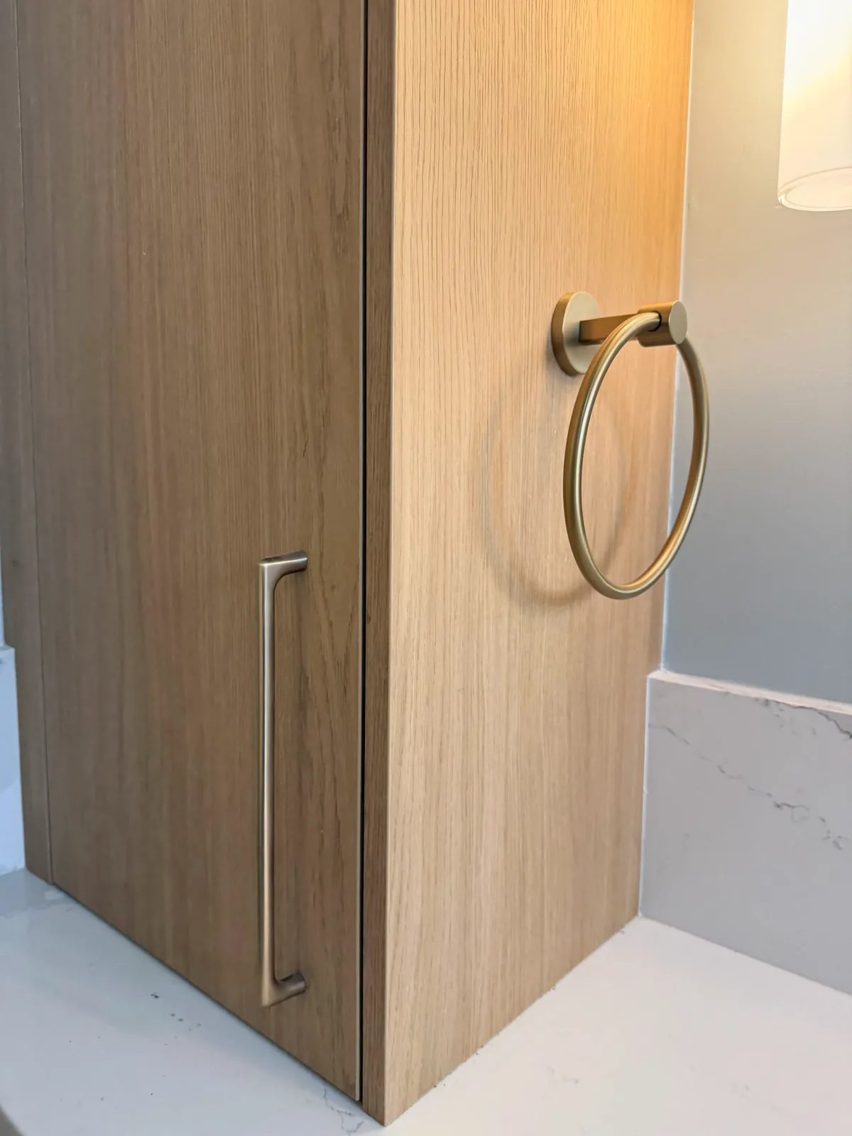 Linen tower with brass towel ring